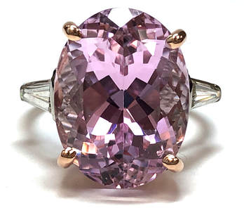 IGI-certified 12.97 carat kunzite & tapered baguette diamond ring in a custom platinum & 14K rose gold setting