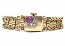 1940s vintage Retro Era 14K gold, star ruby & diamond covered watch, featuring a Blancpain Rayville 17 jewel movement.