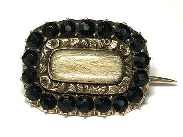 Georgian Era antique 14K gold blonde hair mourning brooch with French jet surround, dated 1826