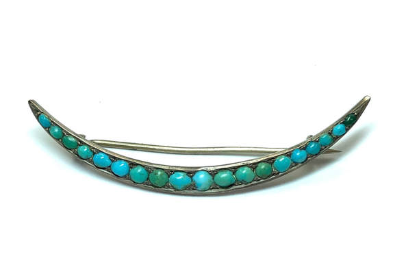 Vintage silver brooch featuring turquoise & green turquoise set in a crescent motif