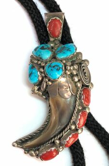 Vintage Southwestern pendant/bolo tie featuring precious red coral, natural turquoise and an animal claw