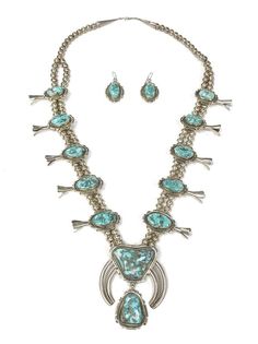 Demi-parure of vintage Southwestern Navajo sterling silver & turquoise Squash blossom jewelry