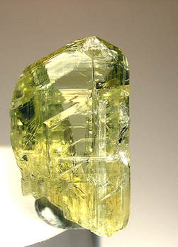 13.58 carat yellow zoisite crystal