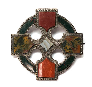 Victorian era antique Scottish agate brooch set with orange jasper, moss agate, banded agate, and bloodstone in a hand chased sterling silver frame