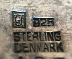 GJ - jewelry trademark of legendary Danish silversmith, Georg Jensen