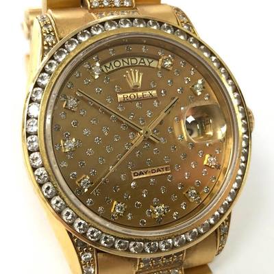 Rolex Day/Date President in solid 18 karat yellow gold, fully customized with a diamond bezel, diamond lugs and diamond dial.