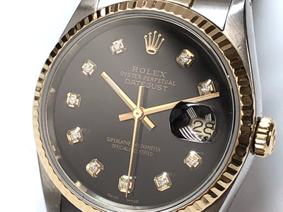 Rolex Datejust 2-tone steel & 18K gold watch with refinished black dial set with aftermarket diamonds
