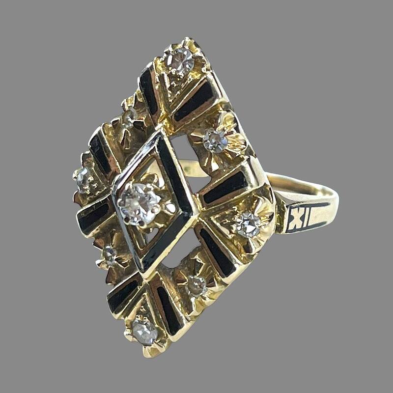 A Victorian Era antique mourning ring with diamonds and black enamel in yellow gold
