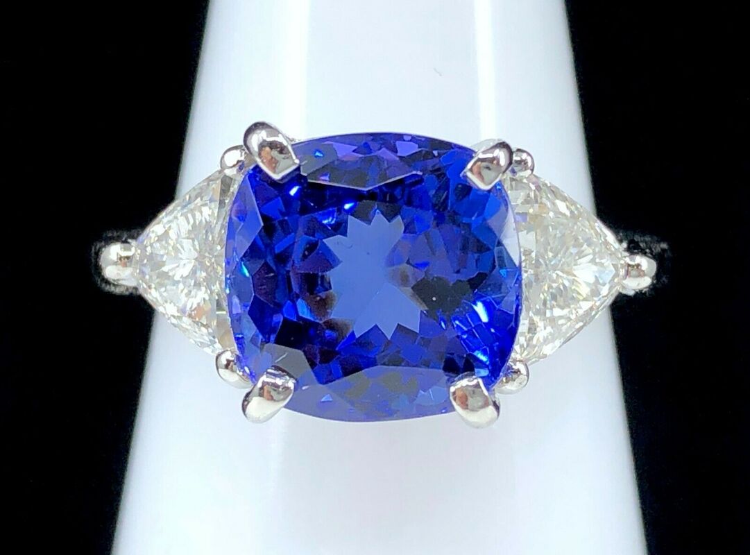 4.93 ct. fine blue tanzanite cushion and trillion cut diamond 3-stone platinum ring