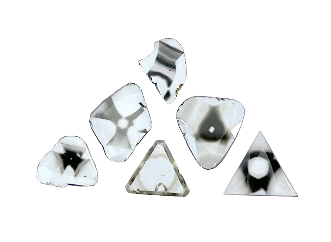 A collection of extremely rare asteriated diamond slices
