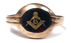 Masonic Square and Compass gold leaf inlay in bloodstone chalcedony.  Set in a rose gold Retro Era setting.