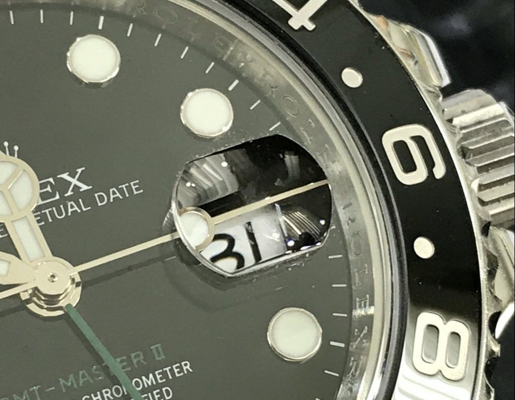 Rolex patented the Cyclops in 1953, and began using it on watch crystals, in 1954, to magnify the date.