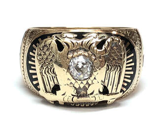 Double-headed eagle emblem of the Scottish Rite, on a 32nd Degree Freemason ring set with a 1/4 carat old mine cut diamond.