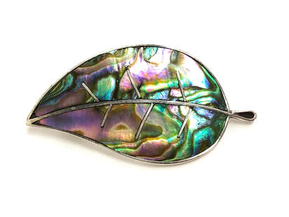 Vintage Mexican leaf brooch set with an abalone mother of pearl inlay.