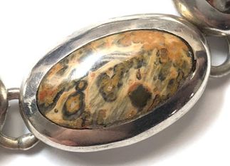 Leopardskin jasper is bezel set in this vintage Mexican sterling silver bracelet