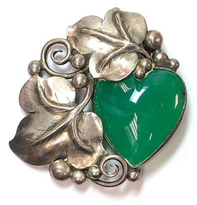 Vintage Southwestern style floral brooch featuring a large heart shaped chrysoprase cabochon set in sterling silver