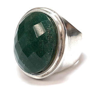 This handmade sterling silver ring is set with a faceted aventurine quartz cabochon containing golden pyrite inclusions.