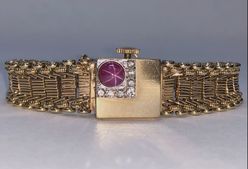 1940s vintage Retro Era 14K gold, star ruby & diamond covered watch, featuring a Blancpain Rayville 17 jewel movement.