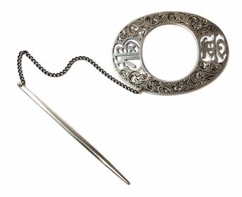 Antique, Edwardian Era, oval shawl pin embellished with wonderful hand-chased detailing, featuring pierced Mandarin characters that translate to 