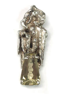 Fantasy cut Heliodor golden beryl set in a handmade sterling silver nugget pendant