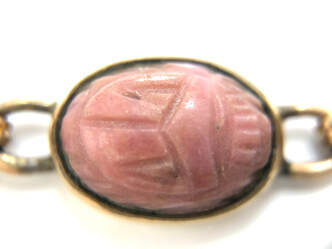 Carved rhodonite scarab bezel set in a 12K rose gold-filled bracelet