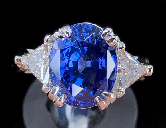 GIA 7.56 ct. natural color change sapphire and diamond ring