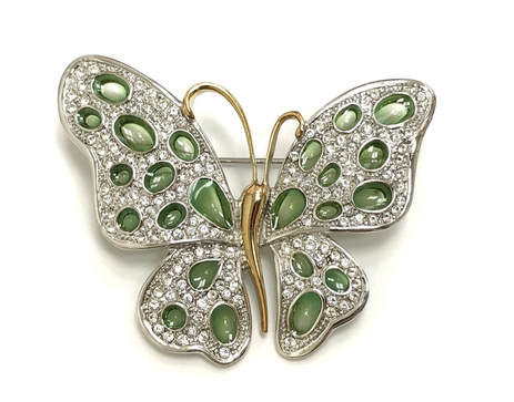 Green plique-à-jour stained glass panels in this butterfly brooch