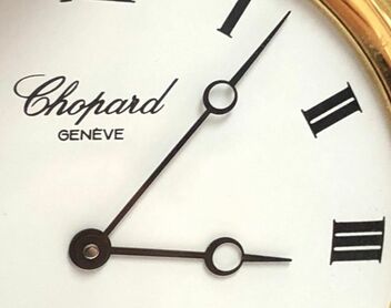 Moon style pocket watch hands on an 18K Chopard dress pocket watch with grand feu enamel dial
