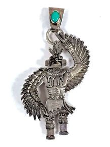Massive sterling silver and turquoise pendant, by Navajo silversmith, Freddy Charley, depicting the Thunderbird.