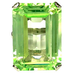 Neon green emerald cut synthetic spinel set in a custom 14K white gold setting