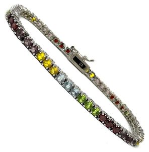 Multi-colored CZs set in a sterling silver designer tennis bracelet, by Caspian
