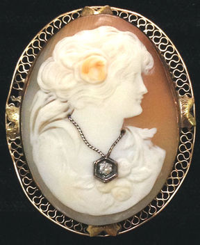 Art Deco era gold filigree & diamond cameo habillé with hand-carved carnelian shell