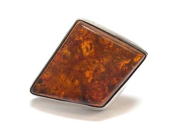 Vintage freeform amber ring set in a custom sterling silver bezel setting