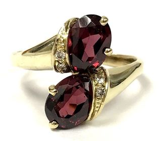 Vintage rhodolite garnet and diamond bypass ring in yellow gold