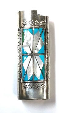 Vintage Zuni sterling silver Bic lighter case featuring a mother of pearl, turquoise, amazonite & serpentine stone-to-stone inlay