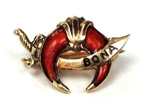 Masonic Shriners enameled lapel pin.  Scimitar and crescent with the Latin phrase 