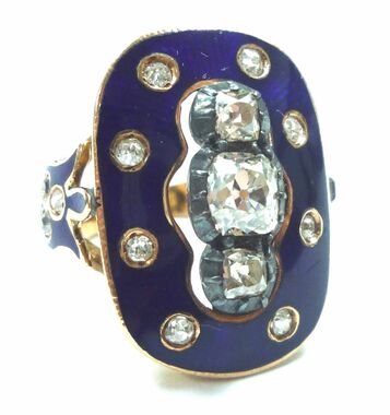 Old mine cushion cut diamonds are set in this spectacular, Victorian era antique silver and gold, guilloché enamel ring