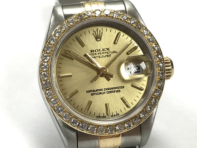 Lady Rolex Datejust 2-tone 18K gold & stainless steel with aftermarket diamond dial and aftermarket champagne dial
