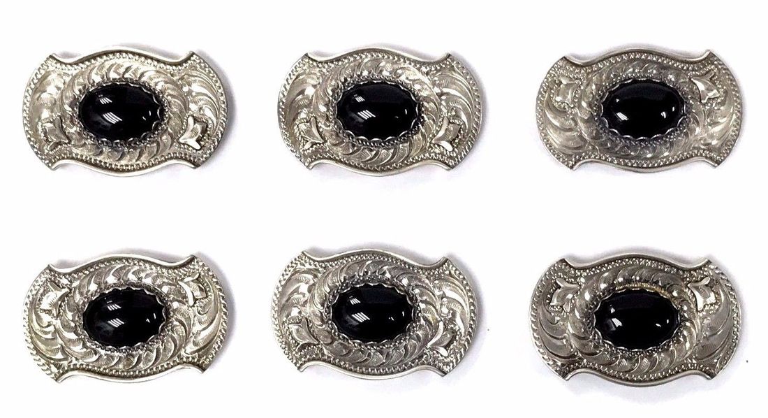 Black onyx cabochons are bezel set in this sterling silver Navajo concho belt set, by Al beres.