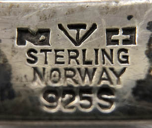 Jewelry hallmark of Norwegian master silversmith, Tone Vigeland.