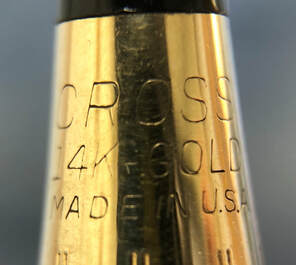 Hallmark for the A.T. Cross Company, specialists in ballpoint pens and writing instruments. (CROSS)
