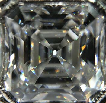 Asscher cut diamond (square shaped step cut with clipped corners)