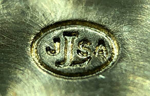 Hallmark of Jean Lassale watch company (JLSA)