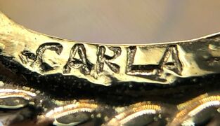 Jewelry hallmark of the Carla Corporation (Carla)