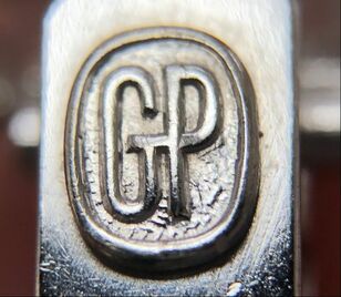 Hallmark of watchmaker, Girard-Perregaux