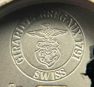 Hallmark of watchmaker, Girard-Perregaux