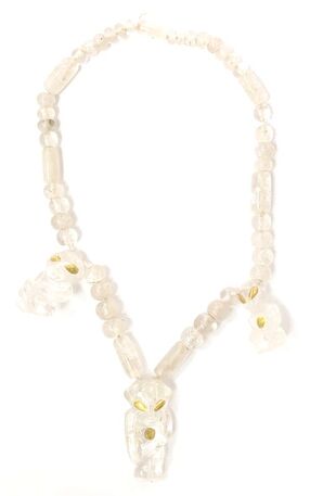 Unusual rock crystal bead necklace featuring 3 carved rock crystal alien bead stations with gold leaf eyes