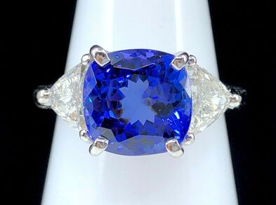 4.93 ct. fine blue tanzanite & diamond three-stone ring in platinum
