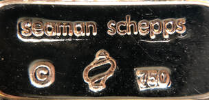 Jewelry hallmark of Seaman Schepps (shell pictomark)