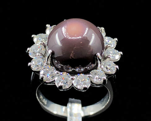 Extremely rare 11.26 carat natural quahog pearl & 2.26 ctw diamond halo ring in platinum
